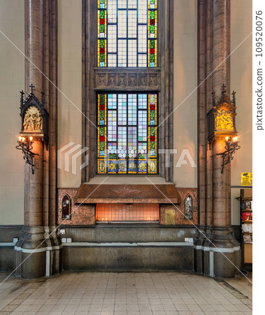 Candle stand under stained glass window at Roman Catholic St. Anthony of Padua Church, Istiklal street, Istanbul, Turkey Candle stand under stained glass window at Roman Catholic St. Anthony of Padua Church, Istiklal street, Istanbul, Turkey 109520076