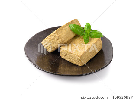 Tofu Cheese Isolated, Smoked Vegan Cheese Slice, Sliced Soya Bean Curd, Soy Protein or TSP 109520987