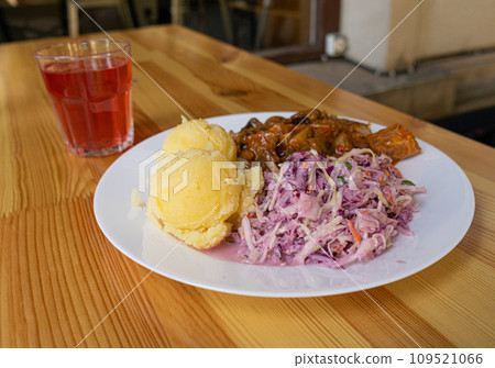 Meat Stew with Mashed Potatoes and Cabbage Salad, Traditional Hungarian Goulash Soup 109521066