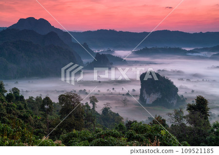 sunrise at phulangka mountain with myst in Phu Langka National Park, Payao Province, thailand 109521185