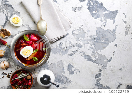 Traditional Ukrainian Russian borscht . Bowl of red beet root soup borsch with boiled egg Traditional Ukrainian Russian borscht . Bowl of red beet root soup borsch with boiled egg 109522759