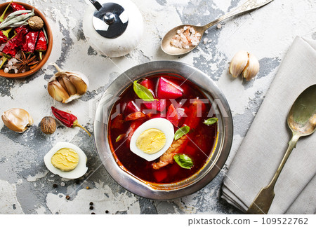 Traditional Ukrainian Russian borscht . Bowl of red beet root soup borsch with boiled egg Traditional Ukrainian Russian borscht . Bowl of red beet root soup borsch with boiled egg 109522762