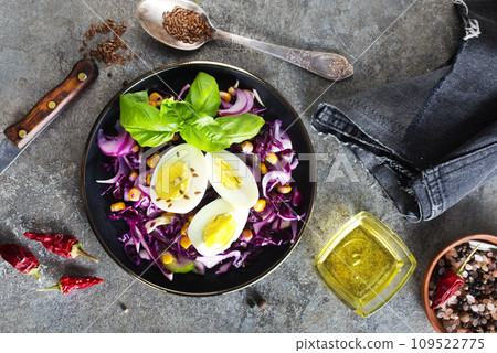 Cabbage salad with corn and boiled egg. Cabbage salad with corn and boiled egg. 109522775