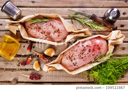 Free Range Chicken Breast on crumpled paper Free Range Chicken Breast on crumpled paper 109522867
