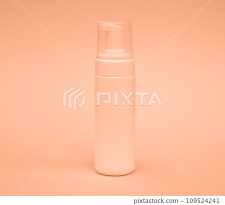 Empty white packaging tube for beauty spa, medical skin care and cosmetic lotion cream packaging, face wash foam, product design layout on pink background Peach fuzz is color of year 2024 tinted image Empty white packaging tube for beauty spa, medical skin care and cosmetic lotion cream packaging, face wash foam, product design layout on pink background Peach fuzz is color of year 2024 tinted image 109524241