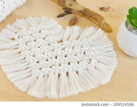 Macrame handmade napkin in the form of heart. Eco diy home decoration. Natural materials, cotton thread. St. Valentine's Day. Macrame handmade napkin in the form of heart. Eco diy home decoration. Natural materials, cotton thread. St. Valentine's Day. 109524586