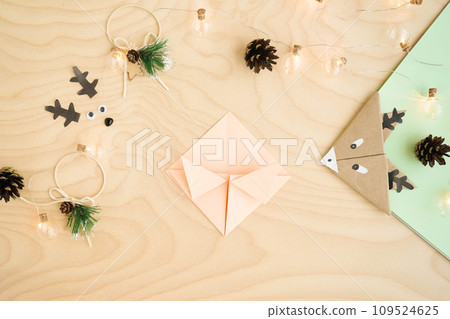 Step 6 origami. Step by-step photo instructions how to make a bookmark in the form of an deer out of paper with your own hands. Simple crafts with children. 109524625