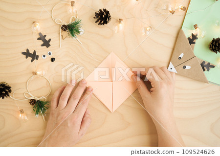 Step 5 origami. Step by-step photo instructions how to make a bookmark in the form of an deer out of paper with your own hands. Simple crafts with children. Step 5 origami. Step by-step photo instructions how to make a bookmark in the form of an deer out of paper with your own hands. Simple crafts with children. 109524626