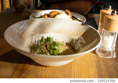 Mushroom Risotto on Elegant Restaurant Plate, Porcini Mushrooms Rissoto, Delicious Italian Risoto Lunch Mushroom Risotto on Elegant Restaurant Plate, Porcini Mushrooms Rissoto, Delicious Italian Risoto Lunch 109524768