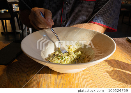 Mushroom Risotto on Elegant Restaurant Plate, Porcini Mushrooms Rissoto, Delicious Italian Risoto Lunch Mushroom Risotto on Elegant Restaurant Plate, Porcini Mushrooms Rissoto, Delicious Italian Risoto Lunch 109524769