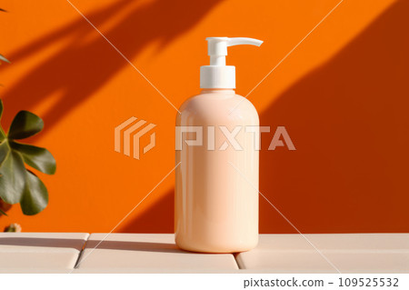 Cosmetic dispenser bottle mockup with orange elements. Generative AI 109525532