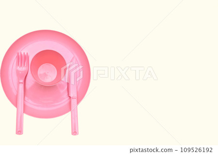 Pink plastic cup, plate, fork,knife for camping, isolated on white Pink plastic cup, plate, fork,knife for camping, isolated on white 109526192