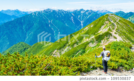 Climbing Mt. Jigatake in summer (view of Mt. Renge and Mt. Harinoki from the middle peak of Mt. Jigatake) Climbing Mt. Jigatake in summer (view of Mt. Renge and Mt. Harinoki from the middle peak of Mt. Jigatake) 109530837