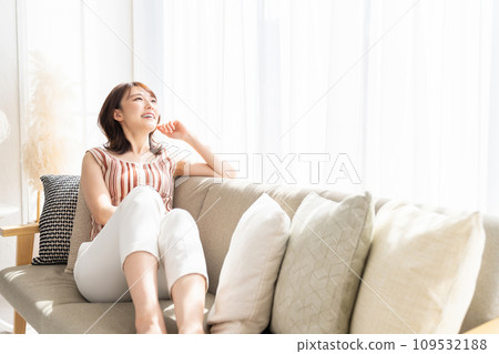A young woman relaxing in the room 109532188