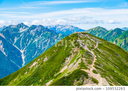 Climbing Mt. Jigatake in summer (view of Mt. Harinoki, Mt. Yakushi, Mt. Minami, Mt. Akazawa, and Mt. Narusawa from the middle peak of Mt. Jjigatake) Climbing Mt. Jigatake in summer (view of Mt. Harinoki, Mt. Yakushi, Mt. Minami, Mt. Akazawa, and Mt. Narusawa from the middle peak of Mt. Jjigatake) 109532263