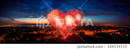 Heart-Shaped Fireworks: A fireworks display in the shape of a heart lighting up the night sky. 109534533