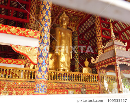 Buddha statue at Wat Suan Dok, Chiang Mai, Thailand, early morning on a sunny day Buddha statue at Wat Suan Dok, Chiang Mai, Thailand, early morning on a sunny day 109535337