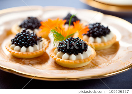 Closeup of natural black caviar served on crackers on black background, texture of fresh sturgeon caviar macro photo. Closeup of natural black caviar served on crackers on black background, texture of fresh sturgeon caviar macro photo. 109536327