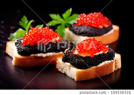 Closeup of natural black caviar served on crackers on black background, texture of fresh sturgeon caviar macro photo. Closeup of natural black caviar served on crackers on black background, texture of fresh sturgeon caviar macro photo. 109536328