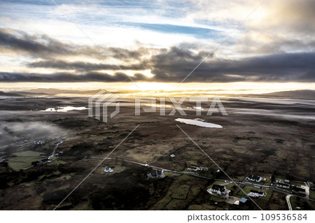 Aerial view of a foggy Bonny Glen by Portnoo in County Donegal - Ireland 109536584