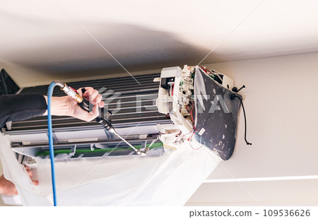 Have your air conditioner cleaned by a cleaning service [Image of deep cleaning] 109536626