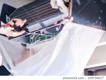 Have your air conditioner cleaned by a cleaning service [Image of deep cleaning] 109536627