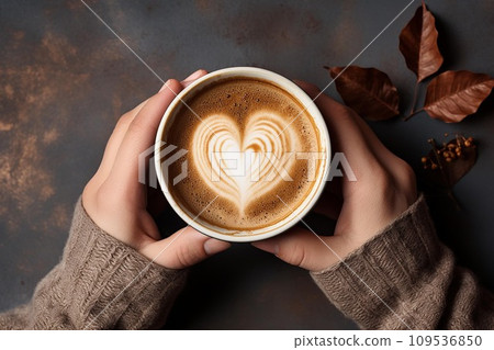 Hands holding a cup of coffee with heart foam latte art  ,Ai Generate 109536850