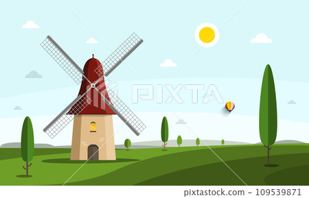 Windmill on field with trees and sun on sky Windmill on field with trees and sun on sky 109539871