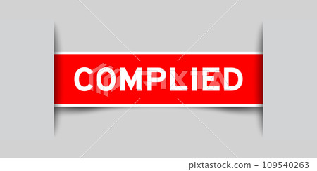 Red color square label sticker with word complied that inserted in gray background 109540263