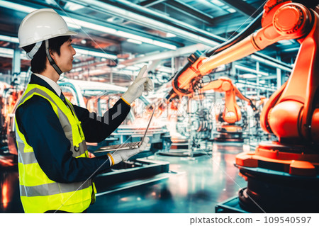 A man checking the factory production line A man checking the factory production line 109540597