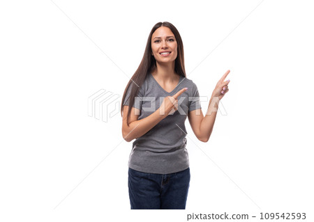 portrait of a charming young european brunette woman in gray clothes on a white background with copy portrait of a charming young european brunette woman in gray clothes on a white background with copy 109542593
