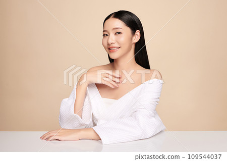 Beautiful young asian woman with clean fresh skin on beige background, Face care, Facial treatment, Cosmetology, beauty and spa, Asian women portrait. 109544037