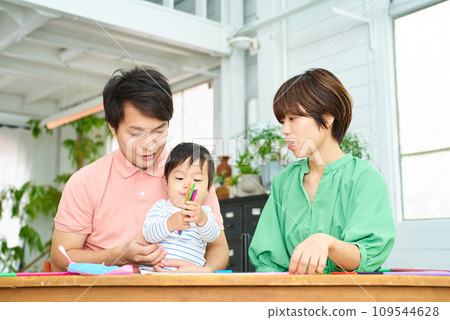 Parents and children playing with drawing 109544628