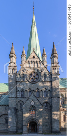 Vertical photo of Nidaros Cathedral entrance, Trondheim, Norway against clear blue sky Vertical photo of Nidaros Cathedral entrance, Trondheim, Norway against clear blue sky 109545449