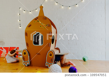 Rocket made of cardboard. Children art project. DIY concept. Cardboard craft. Rocket made of cardboard. Children art project. DIY concept. Cardboard craft. 109547051