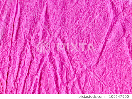 Pink colored crumpled paper texture. Blush purple backdrop. Romantic stationery background. Textured surface matte paper.  109547900