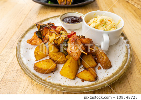 Poultry Shish Kebab, Barbecue Shashlik with Meat and Vegetables, Fruits, Peppers, Onions and Pineapple 109548723