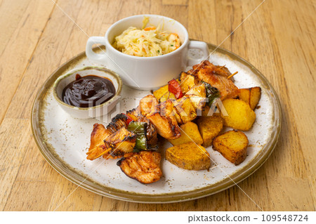 Poultry Shish Kebab, Barbecue Shashlik with Meat and Vegetables, Fruits, Peppers, Onions and Pineapple Poultry Shish Kebab, Barbecue Shashlik with Meat and Vegetables, Fruits, Peppers, Onions and Pineapple 109548724