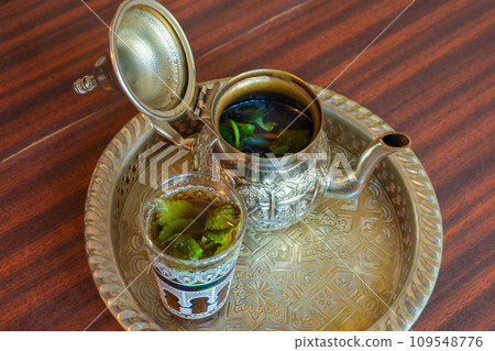 Moroccan Mint Tea in Teapot and Glass 109548776