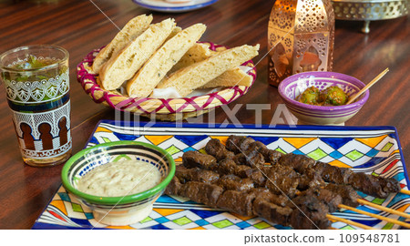 Moroccan Beef Kebab on Skewers, Traditional Arabian Food, Mutton Shashlik, Skewered Grilled Veal Meat Moroccan Beef Kebab on Skewers, Traditional Arabian Food, Mutton Shashlik, Skewered Grilled Veal Meat 109548781