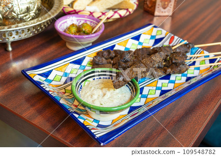 Moroccan Beef Kebab on Skewers, Traditional Arabian Food, Mutton Shashlik, Skewered Grilled Veal Meat Moroccan Beef Kebab on Skewers, Traditional Arabian Food, Mutton Shashlik, Skewered Grilled Veal Meat 109548782