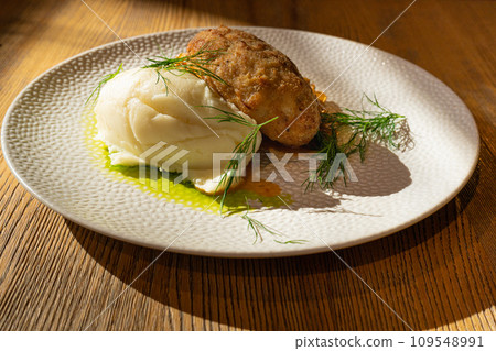 Breaded Meat Cutlets with Mashed Potatoes and Stewed Cabbage Garnish, Restaurant Main Course 109548991