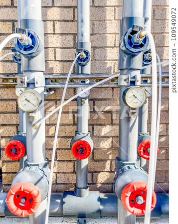 soil vapor extraction test well header with pressure gauge and sample line. soil vapor extraction test well header with pressure gauge and sample line. 109549072