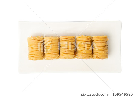 Rolled Baklava Isolated, Ramadan Dessert Roll on Restaurant Plate, Eastern Sweet Pastries 109549580