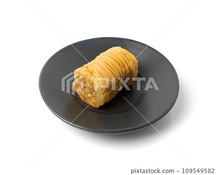 Rolled Baklava Isolated, Ramadan Dessert Roll on Restaurant Plate, Eastern Sweet Pastries 109549582