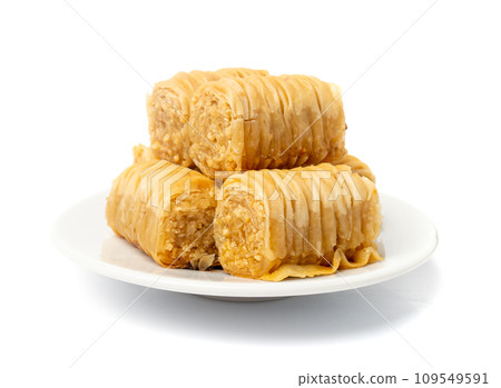 Rolled Baklava Isolated, Ramadan Dessert Roll on Restaurant Plate, Eastern Sweet Pastries 109549591