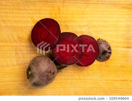 Beet root cross sections. Beetroot slices, red beets cut Beet root cross sections. Beetroot slices, red beets cut 109549664