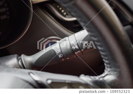 Car light control switch close up Car light control switch close up 109552323