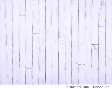 Background image of a distressed pale violet vertical board wall 109554056