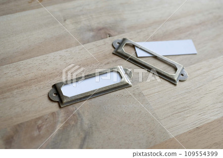 name plate on a wooden board name plate on a wooden board 109554399